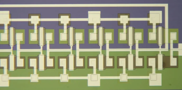Six CMOS inverters forming a ring oscillator